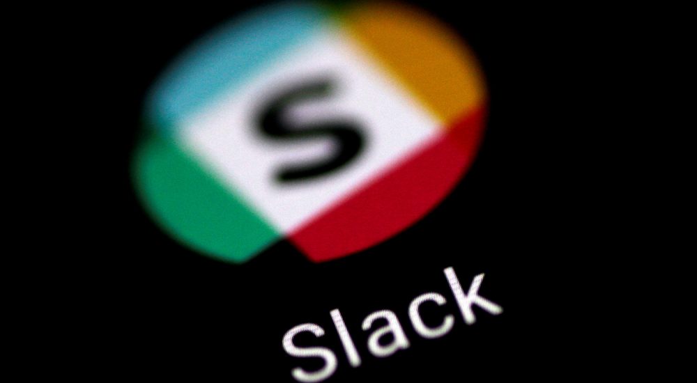 The Slack messaging application is seen on a phone screen August 3, 2017.   REUTERS/Thomas White - RC172D5A2AC0