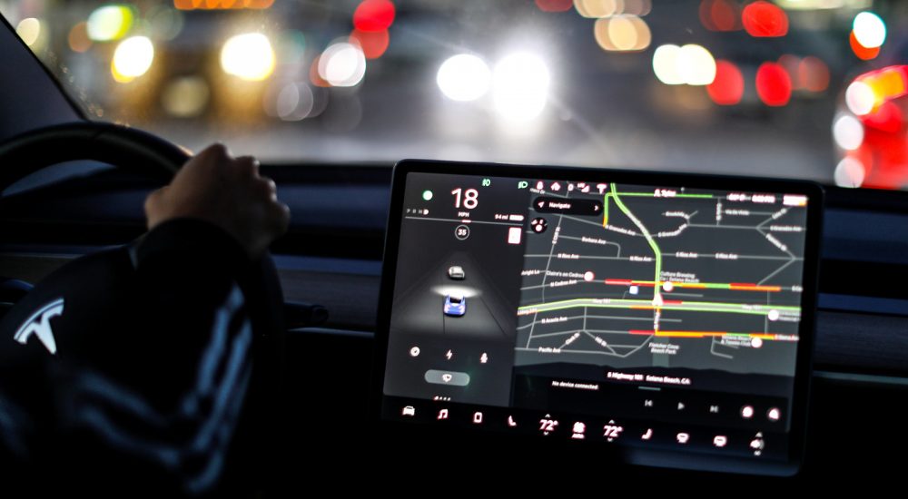 Auto pilot is shown on a 2018 Tesla Model 3 electric vehicle in this photo illustration taken in Solana Beach, California, U.S., June 1, 2018. Picture taken June 1, 2018.     REUTERS/Mike Blake