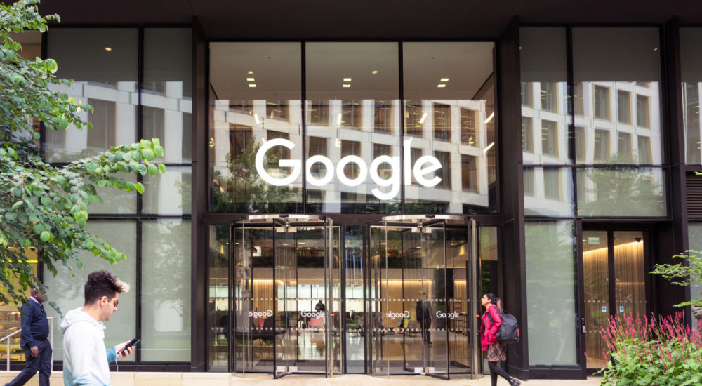 London, UK - People outside Google's headquarters office building in King's Cross, London.
