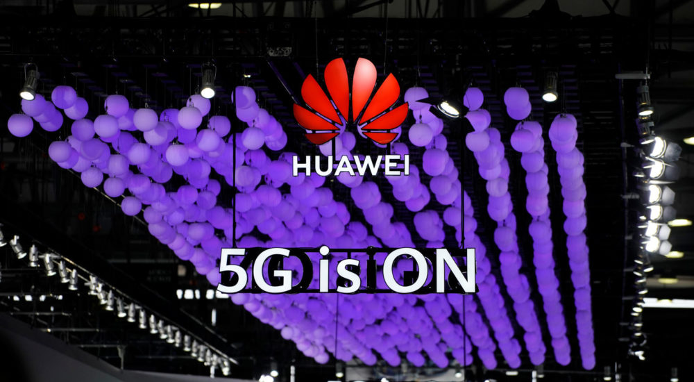 A Huawei logo and a 5G sign are pictured at Mobile World Congress (MWC) in Shanghai, China June 28, 2019. REUTERS/Aly Song